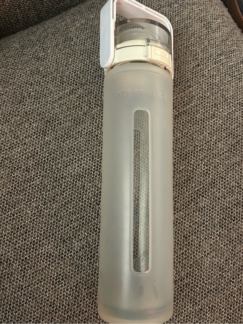 Starbucks glass water bottle with locking flip top lid. 2010 16 ounce with cover
